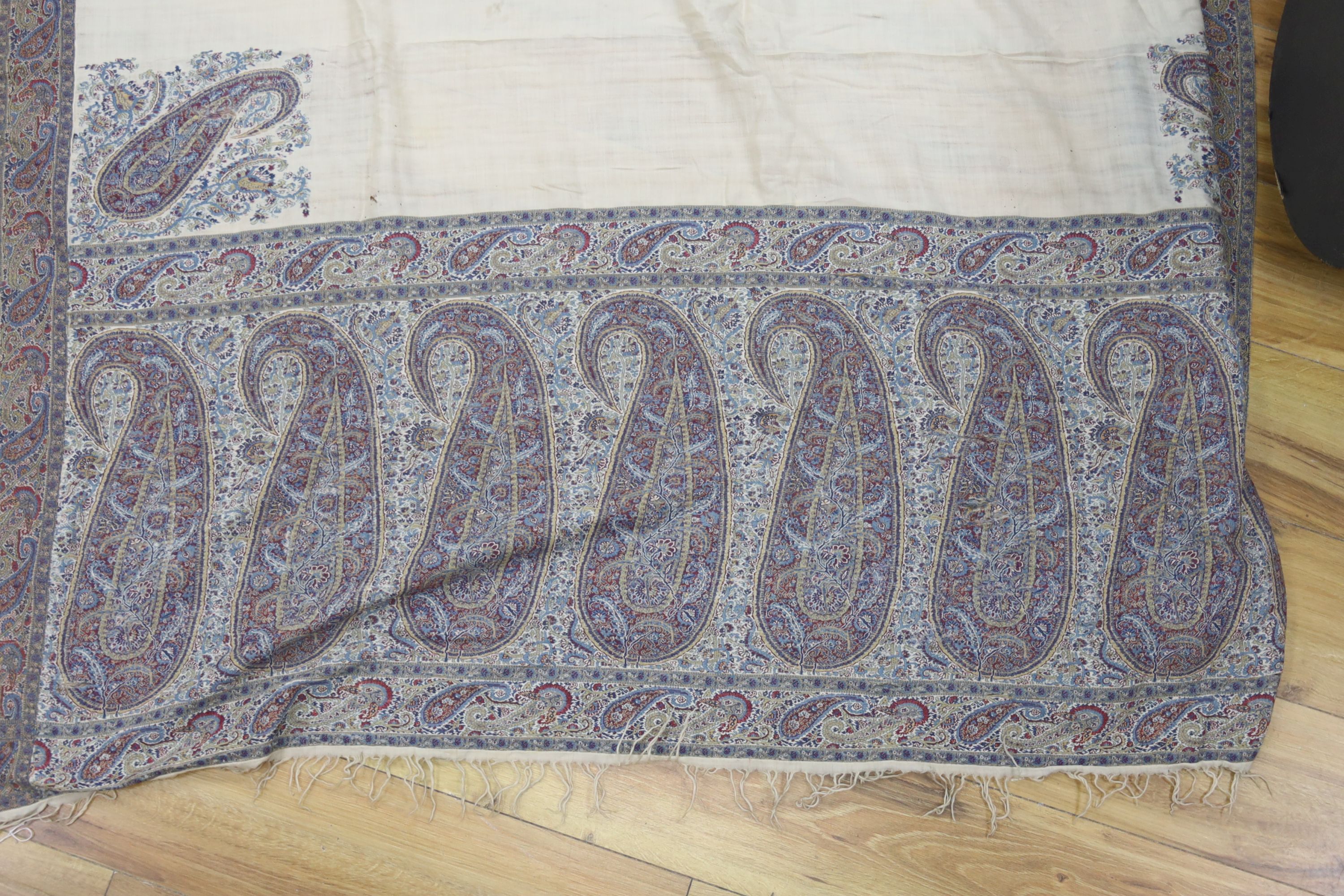 A 19th century Paisley bordered summer shawl